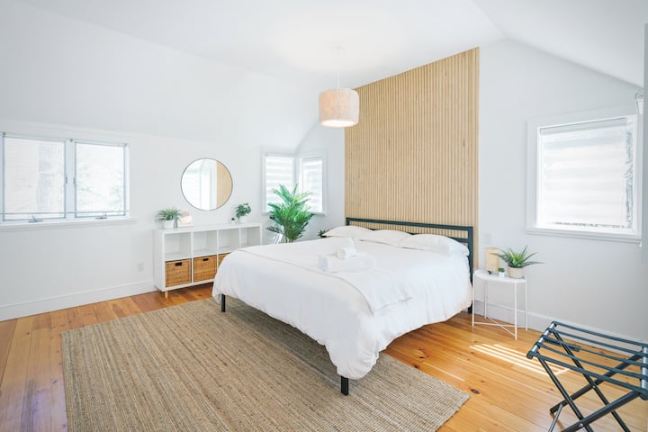 Master Bedroom (top floor) - The largest of the 4 bedrooms, it's a very bright/open space with a King bed and plenty of storage options. It also features a small balcony overlooking the front of the property. Very private as it's on its own floor.