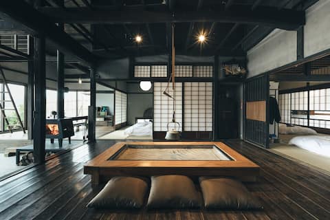 Private rental of a 130-year-old house with a traditional Japanese sunken fireplace, wood stove, and