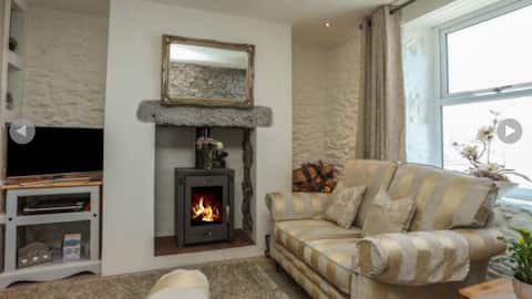 Seaview cosy cottage log fire easy walk to beach