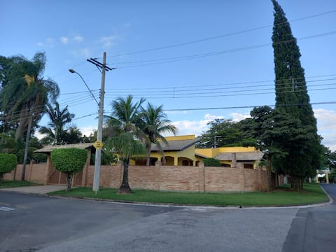 House with swimming pool and barbecue area in a condominium.