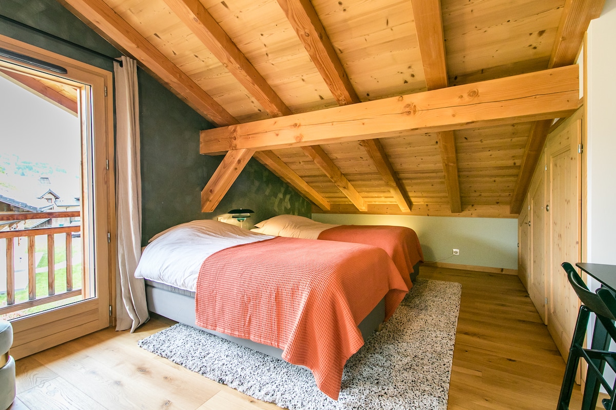 Bedroom 3 with 4 single beds and balcony