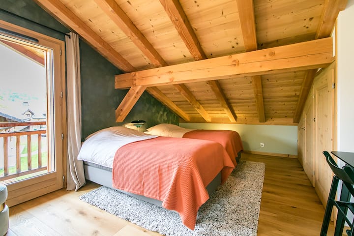 Bedroom 3 with 4 single beds and balcony