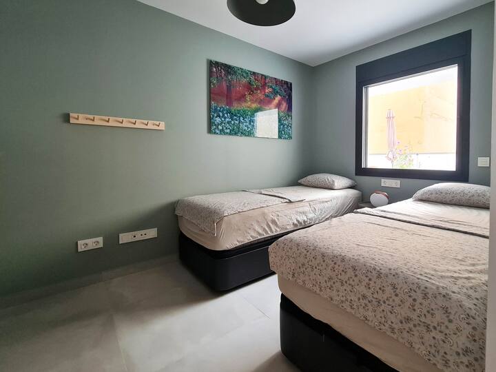 2nd bedroom, you can place the beds next to each other if you want.