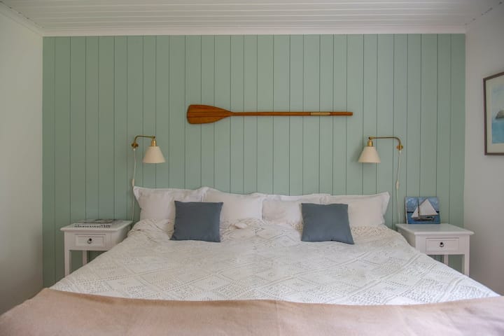 Master bedroom with 2x105 cm beds and several wardrobes.