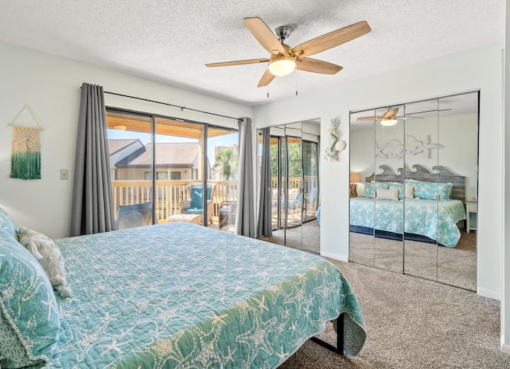 Master bedroom features 2 closets and glass door that leads to newly renovated balcony