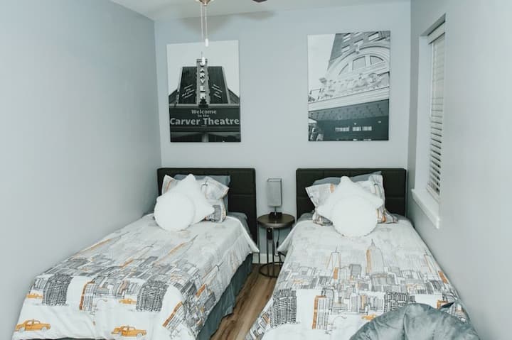 Bedroom 3: 2 twin beds on lower level of the home and a spacious closet. We added a touch of details of our wonderful city "Birmingham"