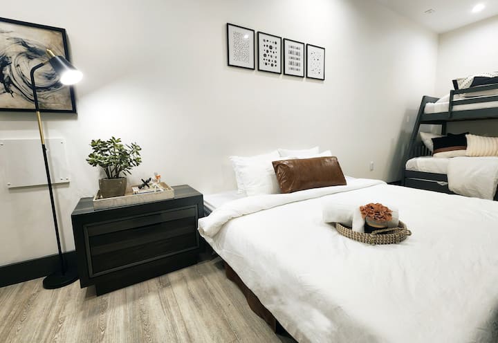 Bedroom with twin over full bunk and trundle with two sleeper chairs that converted into one king bed