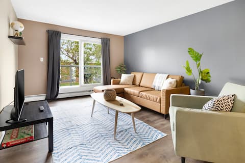 Top Airbnb: Steps from Rogers, Gmac, and LRT | Modern Condo in Central Mc Dougall