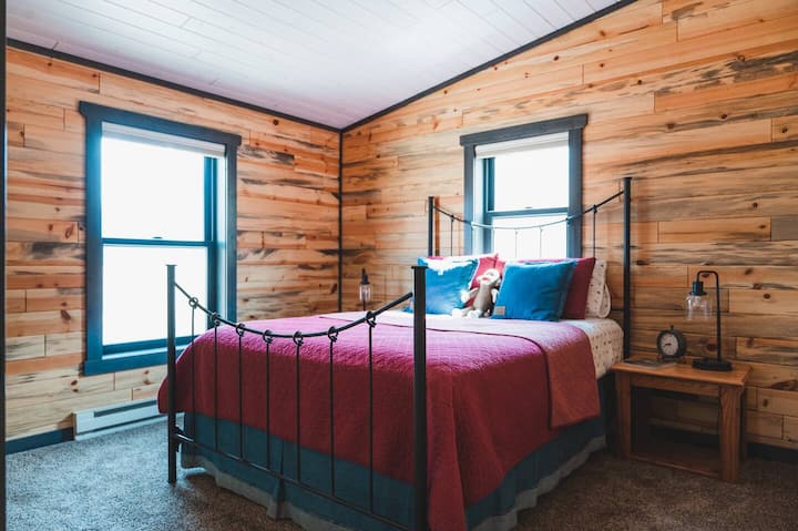 Bedroom 1 features a queen size bed.