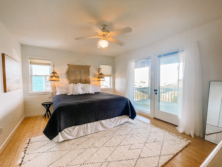 One of two king suites with private bathroom and lower level deck access with hammock overlooking the dunes and ocean.