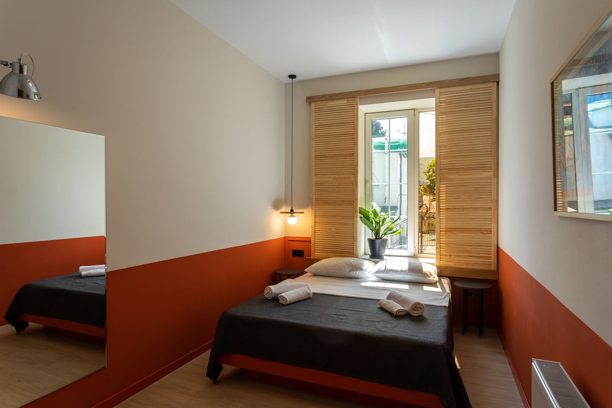 Well-placed mirrors reflect the natural light