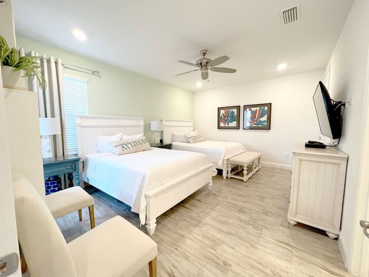Double queen bedroom for a large family.