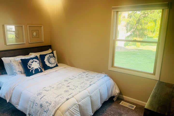 Get some rest in the Queen-Sized Guest Bedroom