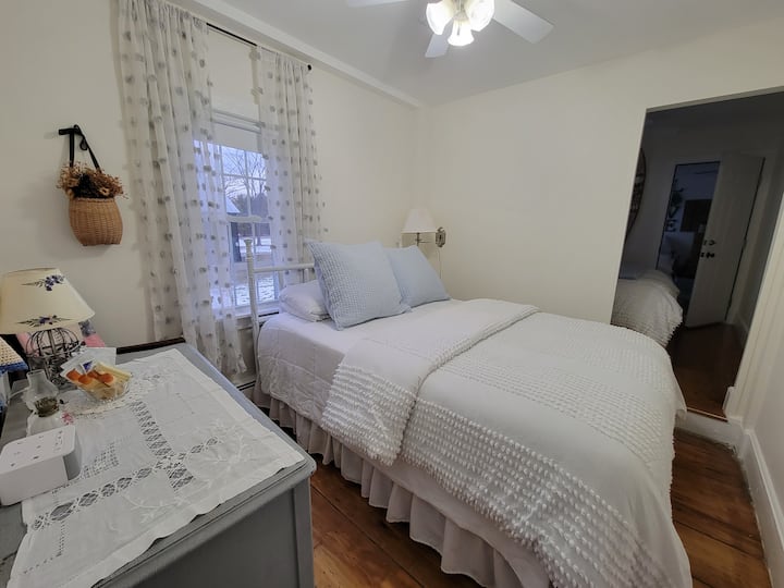 Bdrm 5 -(2 room suite, room 1) Queen bed  + private bath.  Note locking door separating Master Suite (Bdrm 6)