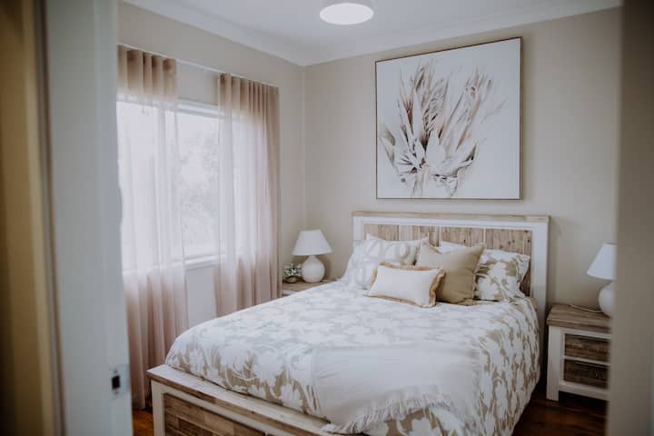 Bed 2 - with views out over rolling hills at the rear of the Cottage, this Queen room is guaranteed to provide the rest and solitude you are after.