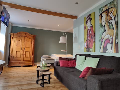 Erfolgreiche Airbnb-Immobilie: Stylish, clean apartment near the city center & main station in Rostock