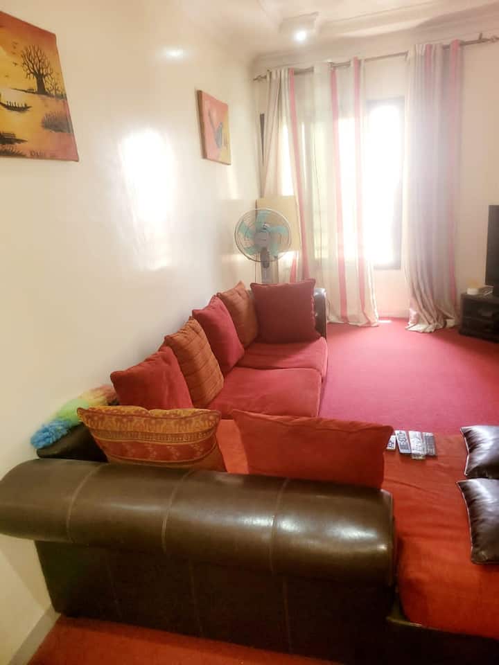 Dakar studio bedroom and separate living room 2 toilets,w Apartments