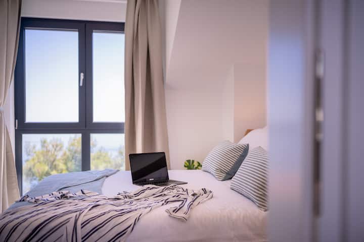 Cama con una bonita vista, ¿qué más necesitas?