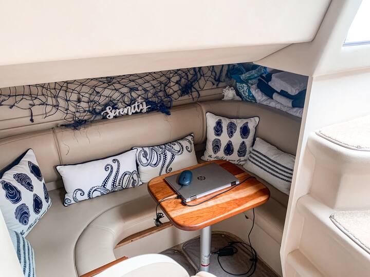 This wooden table serving as the boat's laptop station can be removed and a comfortable twin bed can easily be created here in this second bedroom (ask me how). 