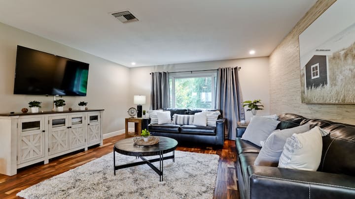 Unwind in this inviting living space featuring chic decor, a spacious layout, and plenty of natural light ideal for relaxing, reading, or spending quality time with loved ones.