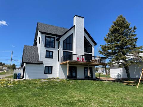 House on the edge of the sea in Gaspésie