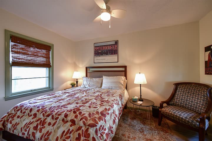 One of two queen beds in the house.
