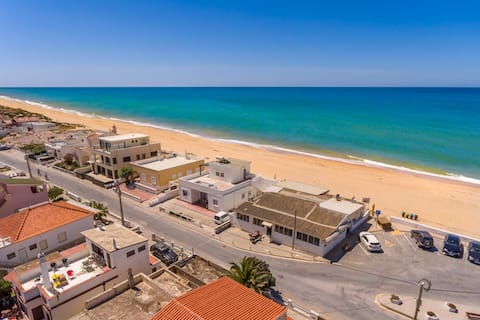 Two beachfront semi detached villas on the sand