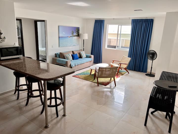 A modern apartment with a balcony near the sea Holiday homes for Rent