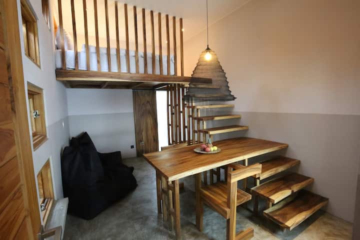 3x identical split-level (mezzanine) designer bedrooms with queen-sized bed – intimate for couples / adventurous for kids. All rooms are air-conditioned, with table & chairs, seating nooks and a private outdoor rain shower bathroom.
