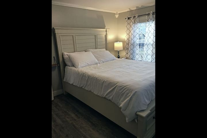 Queen bed in the master bedroom