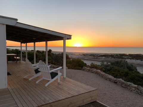 little white shack on the beach