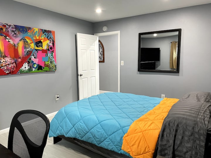 Master I - This modern  bright Master bedroom pared-down, sleek look is conducive to getting a good night's rest or turn on the smart flat screen and lull yourself to sleep. Window A/C, for warm summer nights and Heat for brrrr NY times available 4 u