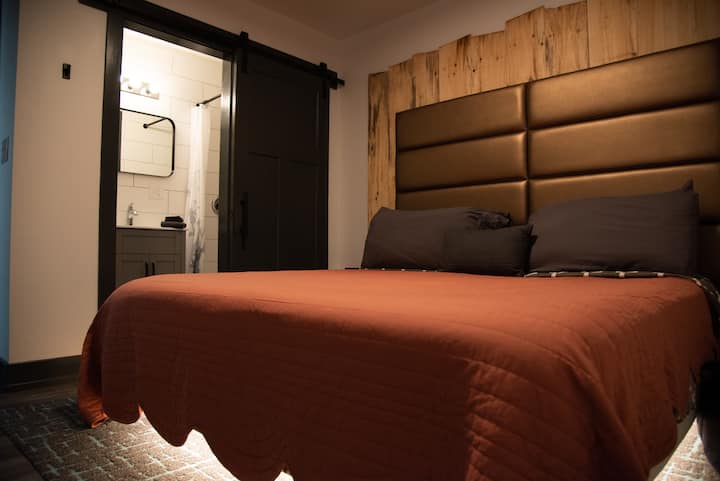 Bedroom #1 - king sized bed with under bed lights and ensuite bathroom