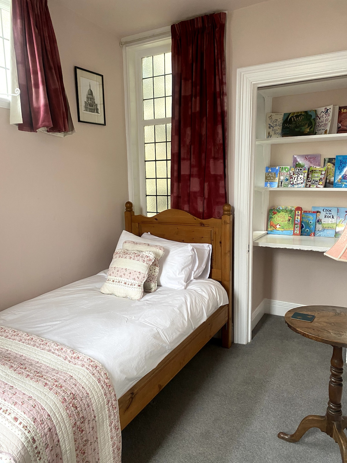 Single bedroom idea for children - a travel cot can be left for you to make up too