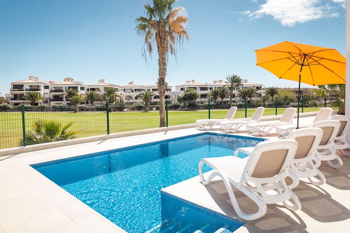 Villa 10 · Queen, Amarilla Golf — pool terrace with sun loungers