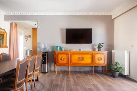 Successful Airbnb property: Entire 4BR Home | Terrace | 2 Bathrooms | Parking in Δήμος Καλλιθέας