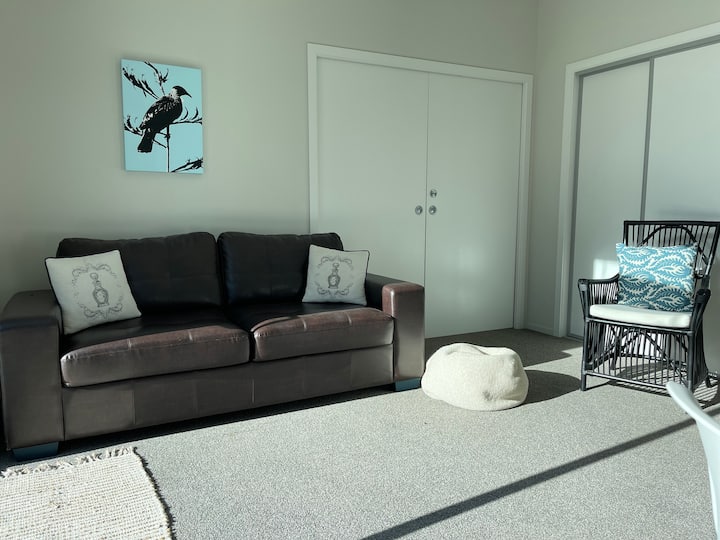 2nd Spacious Lounge with country outlook over large extensive decks and fire pit,.