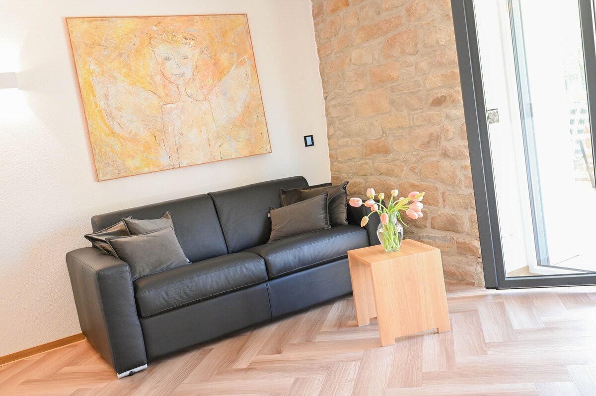 Get comfortable on the couch with a wine or enjoy the cool of the sandstone wall after a bike ride.