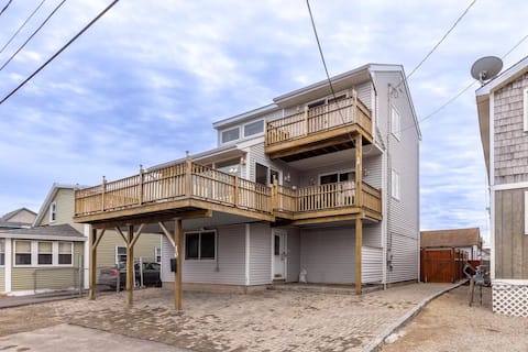 Luxury Beach House Sleeps 16. Steps from the Sand.