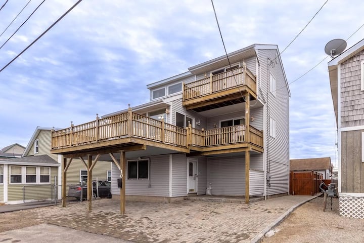 Luxury Beach House Sleeps 16. Steps from the Sand.