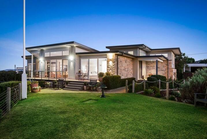 Grand Coastal Home with Tennis Court gallery image 2