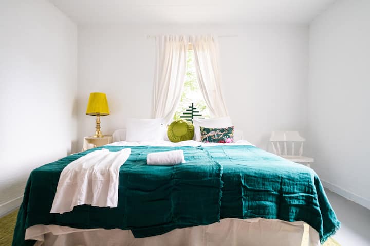 bedroom on the ground floor with a double bed 