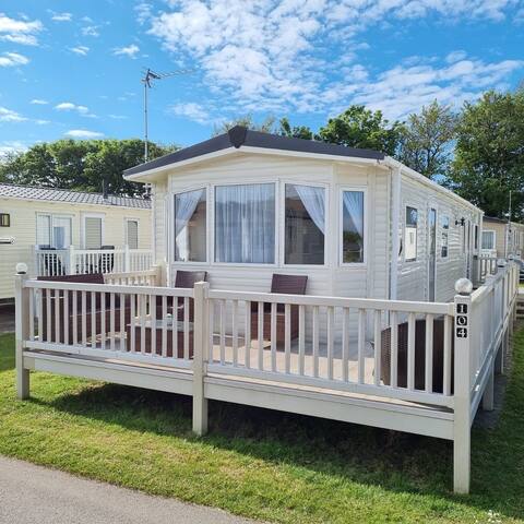 Lovely 3 bedroom caravan on a sun trap spot.