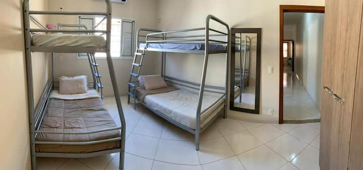 Single room: 
- 2 bunk beds 
- 1  wardrobe with 6 doors 
- 1 full-length mirror 
- Air conditioning 
OBS: illustrative bed linen