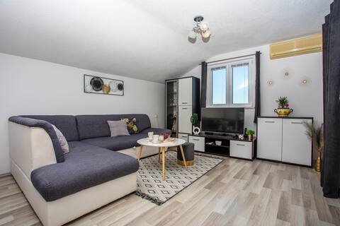 Successful Airbnb property: Apartment with a private fenced pool and seaview in Stanići