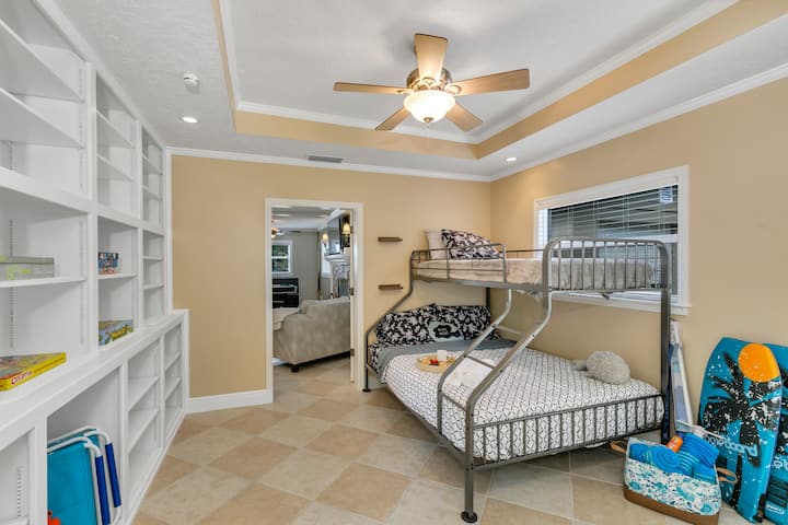 Bedroom 5: Twin XL over Queen bed, ceiling fan, utility closet with washer and dryer and beach toys and extra full size refrigerator (2 boogie boards, 2 beach chairs, beach umbrella, 6 beach towels, beach tote bag and beach blanket).