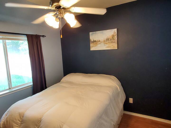 Comfortable Queen bed with fresh linens and pillow.  Just a couple of steps away from a semi private bathroom (shared with up to two guests).

Private closet and dresser with plenty of room to store your clothing and other personal items.