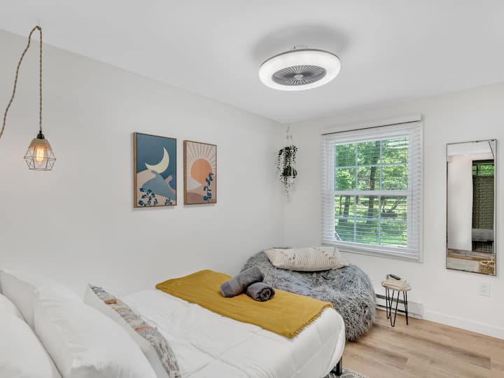Our "small bed" features a Big BEAN BAG CHAIR to go watch your favorite shows on our Rocku-Ready Smart TV.