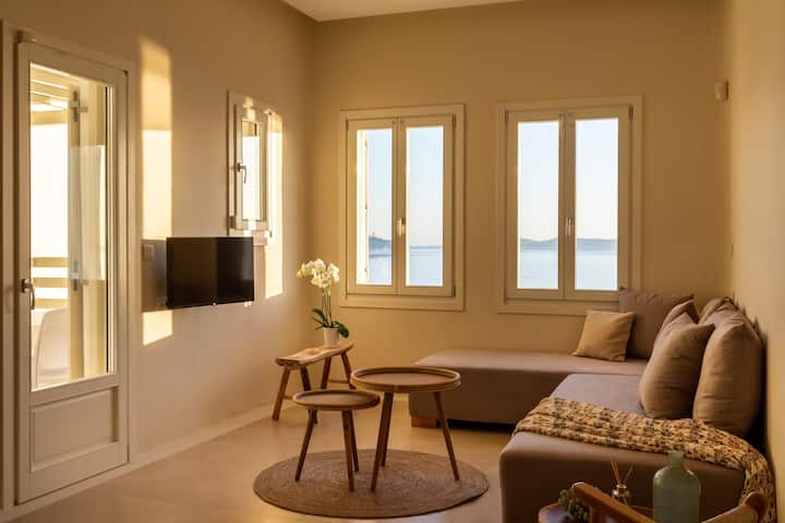 Living room with sea view windows