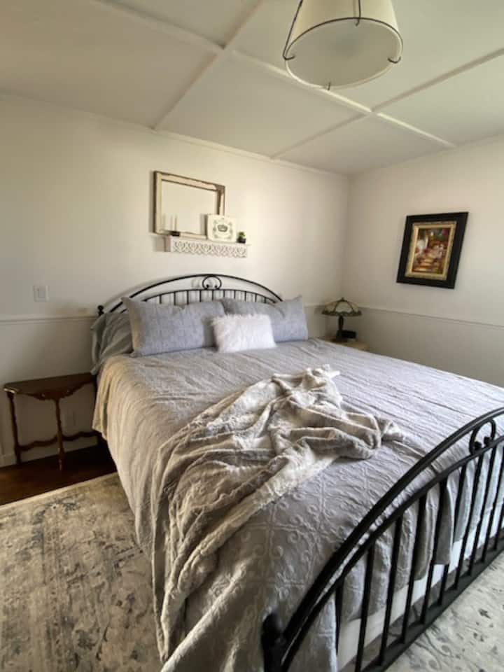 Primary bedroom with king bed downstairs. 